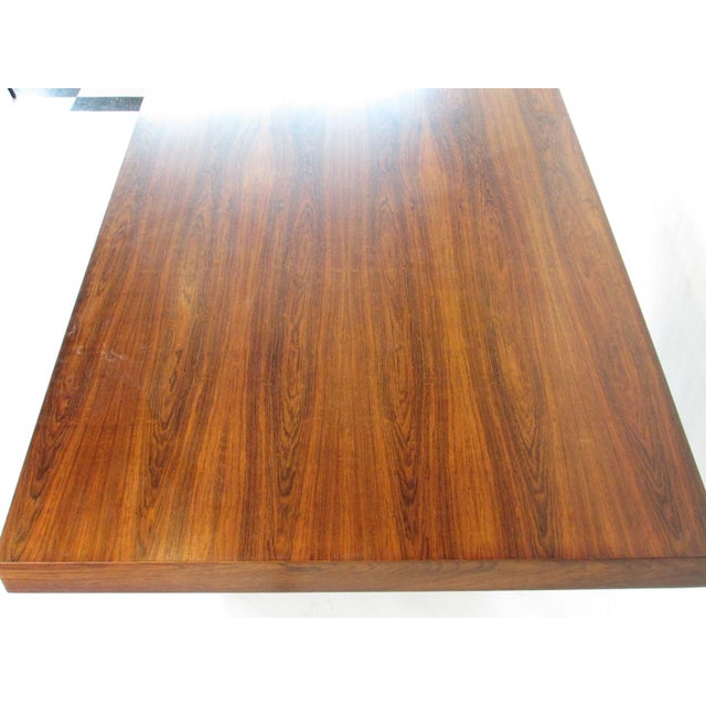 Purchased from the estate of the original owner . Fine rosewood executive desk designed by Roger Lee Sprunger . Sprunger...