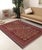 Experience the exceptional craftsmanship of this stunning Soumak rug, expertly created by skilled master weavers. Made...