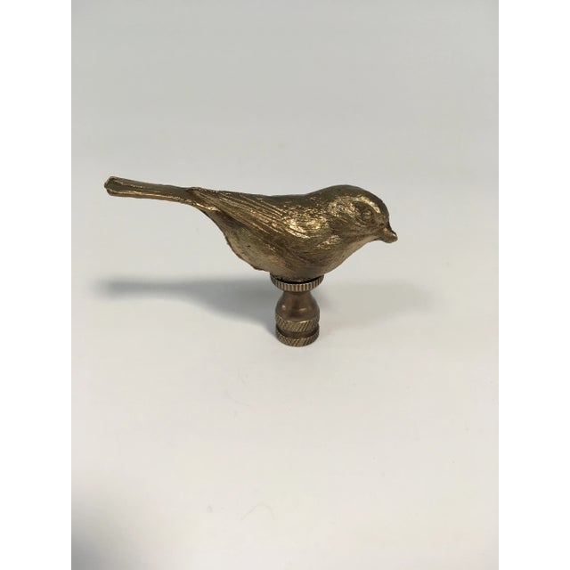 Pair of solid metal sparrow finials will give your lamps a woodland finish.