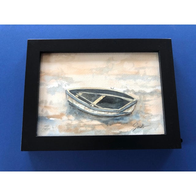 Rowboat at rest while waiting for the tide to come in. Standard size. Rustic seascape, signed.