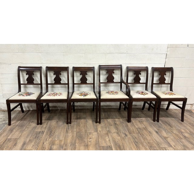 This is a stunning full set of six vintage, possibly antique, Regency Duncan Phyfe style needlepoint dining chairs with...