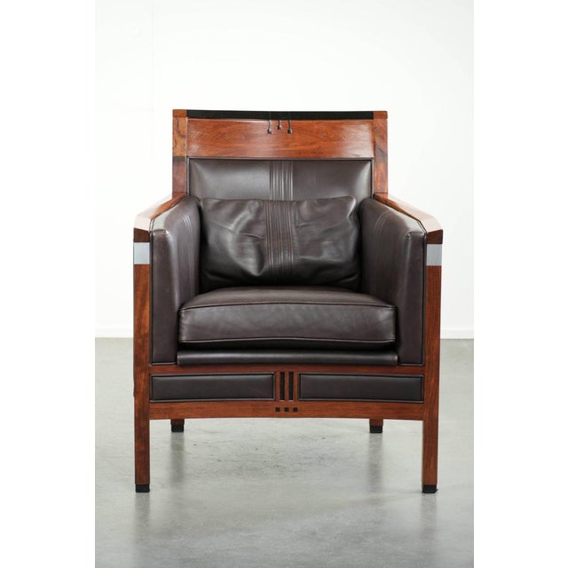 This luxurious Art Deco design armchair by Schuitema from the Decoforma series is finished in dark brown cowhide leather...
