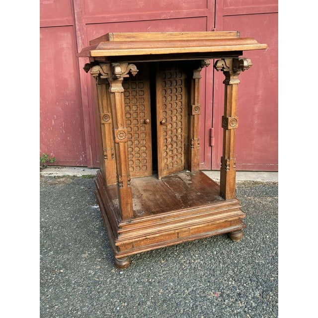 Gothic-style side/display cabinet. It features a 19 cm deep cupboard. Made entirely of oak with carved details. The...
