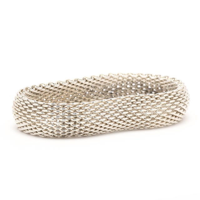 Circumference: 7 in. Width: 5/8 in. Weight: 35 dwts. / 54.4 grams Stamps: "925 Tiffany & Co" SKU: B1295 A Couple Of Things...