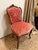 A beautifully preserved antique French Louis XV–style side chair dating to the late 19th century, featuring an elegant...