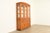 An exceptional Mission or Arts & Crafts lighted breakfront bookcase cabinet, dining cabinet, or display cabinet In the...