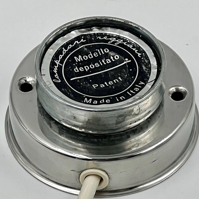 The reggiani eyeball lamp, a notable example of 60s italian lighting design, offers both functionality and style. With its...