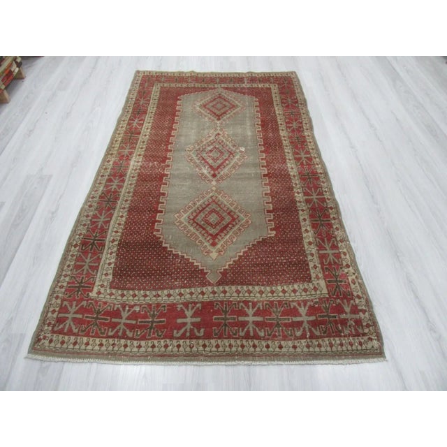 Hand-knotted vintage rug from Konya region of Turkey. Approximately 50-60 years old. In very good condition.
