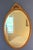 Beautiful large antique oval beveled glass mirror estimated to be from the 1930s-1950s. Features a beautifully aged solid...