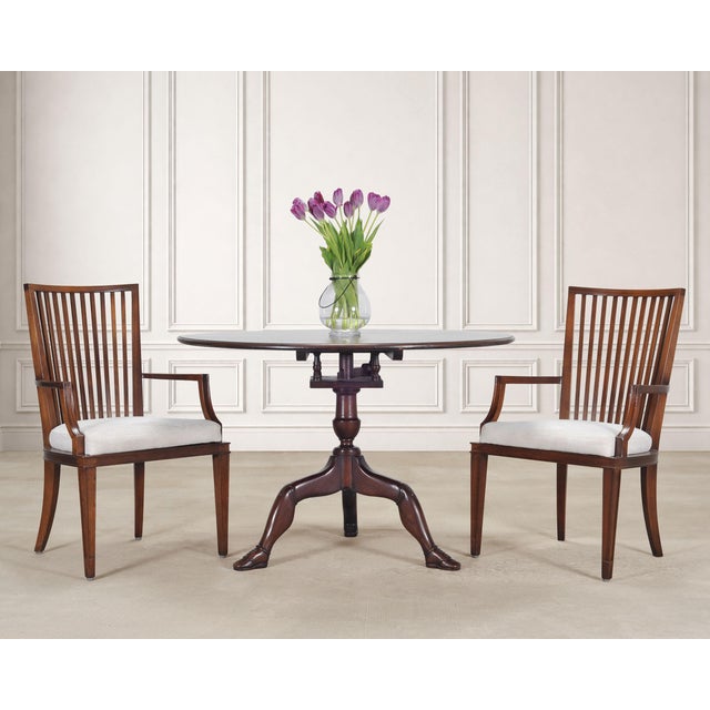 An elegant set of six dining chairs designed by Barbara Barry for Baker Furniture, comprised of two armchairs and four...