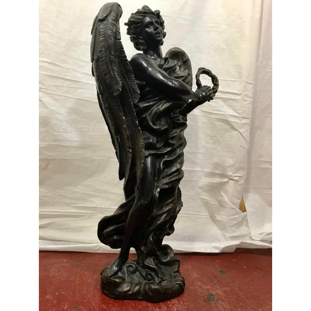 Gabriel? Michael? (I'm partial to Michael, I wonder why?) Contemporary bronze statue in the baroque style.