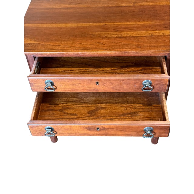 This charming two-drawer side table (can also function perfectly as an end table or nightstand) is from Lexington...