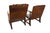 This pair of English late 19th/early 20th century Jacobean style oak armchairs which coverts to a table is a stunning...