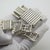 This rare vintage silver collectible set features a miniature dollhouse outdoor furniture suite consisting of 4 folding...