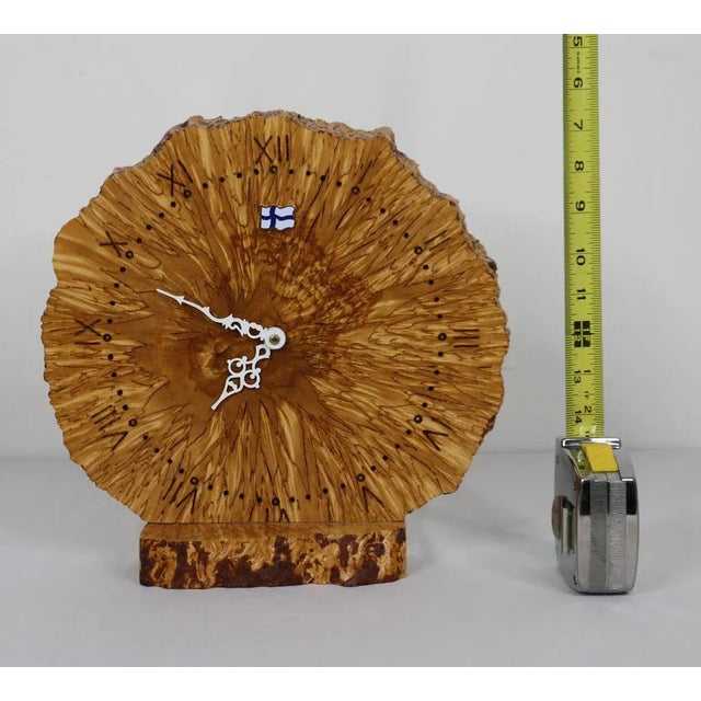Handmade wood clock from Finland; Made by Pentti Niska; Measures approximately H 11 3/4 x W 11 1/2 x D 3 1/2 inches;...