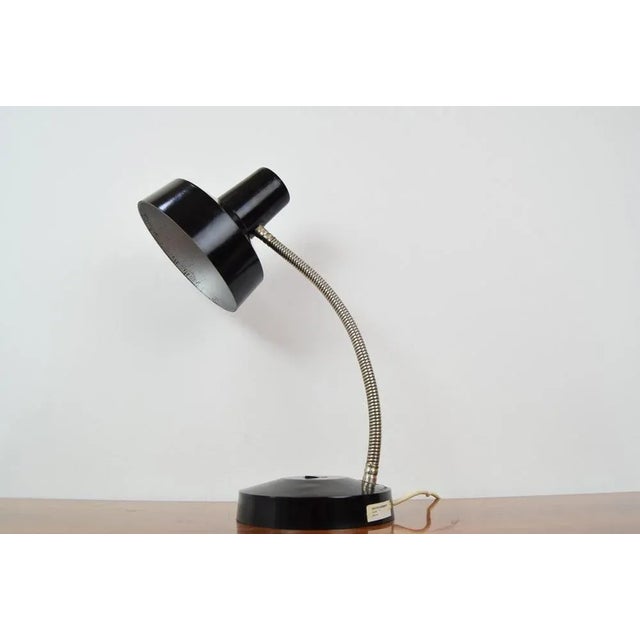 Made in Czechoslovakia. Made of bakelite and chrome. Good original condition US adapter included. 1x40W, e27 or e26 Bulb....