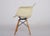 PAW (Swivel Dowel Base Rope Edge) chair in "Parchment" colored fiberglass, designed by Charles & Ray Eames for Herman...