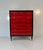 Elegant Italian Art Deco chest of drawers produced in the 1950s. The six drawers are finished in striking cherry red...