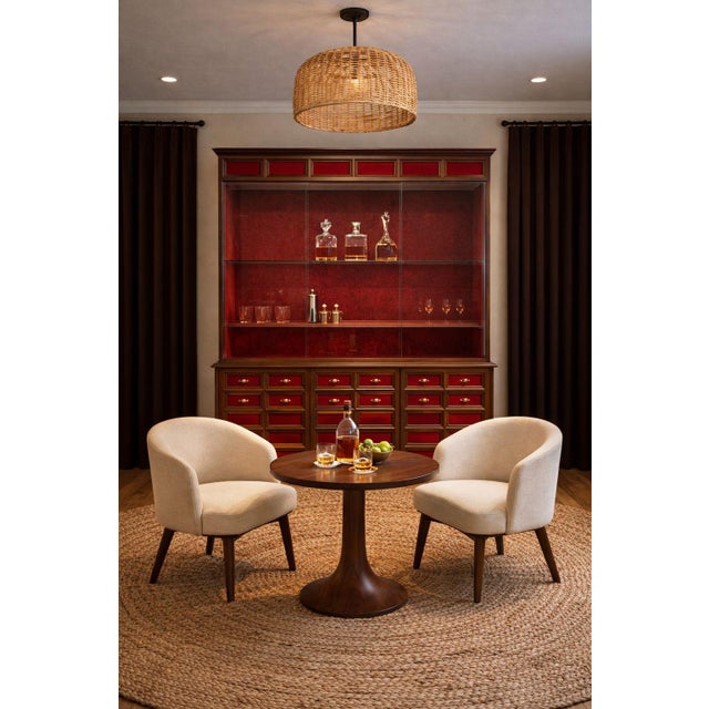 Exceptional Mid-Century Modern hutch dating to the 1960s and crafted in Spain. This striking piece combines architectural...