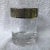 Very unusual design in platinum along the rim of these double old fashion glasses. I have seen them with the same pattern...