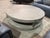 The Restoration Hardware “Verrazano” Coffee Table is a striking study in architectural form, material contrast, and modern...