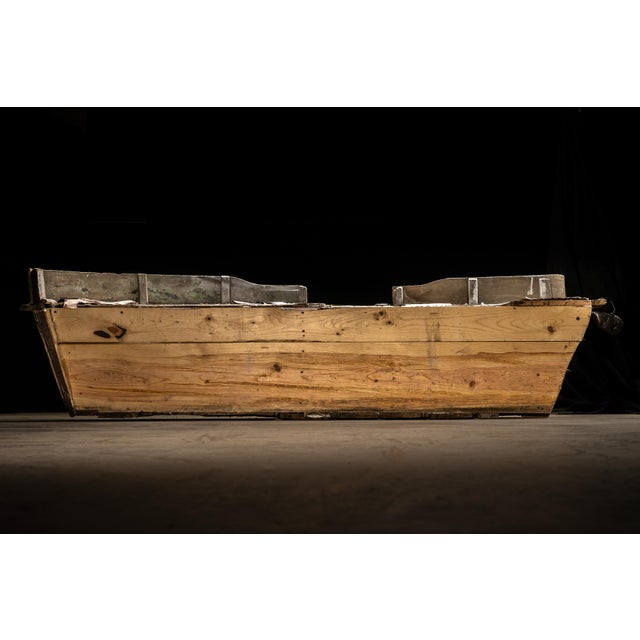 This half boat was originally part of a carnival ride on Coney Island in New York. It then spent the next portion of its...