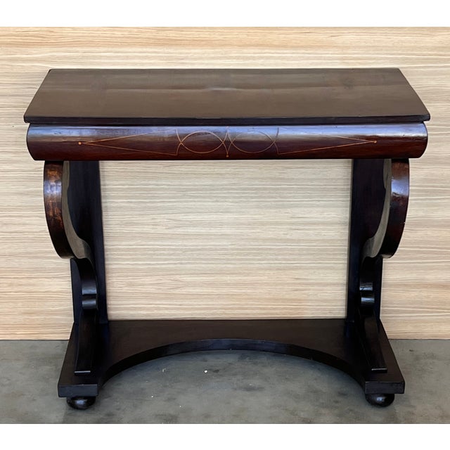 Absolute unique walnut wall console table artfully made in the early Biedermeier period circa 1830 in Austria. Made with...