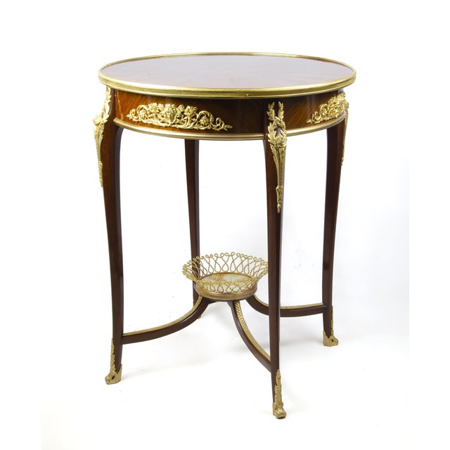 Late 19th century Louis XV circular gueridón table with ormolu accents attributed to François Linke for Maison Forest,...
