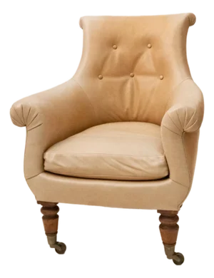 A Regency Style Beige Leather and Mahogany Bergere Armchair
