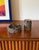 Brutalist top smoking set, ashtray and cigarette box Morbelli Italy 1970 metal H 10 cm x 7 × 7 cm H 5 cm x 13 cm diam....