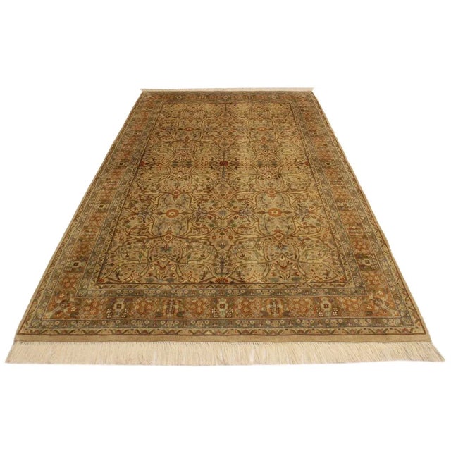 Designed with mesmerizing intricacy and gorgeous color palette, this hand-knotted masterpiece demonstrates the beauty and...