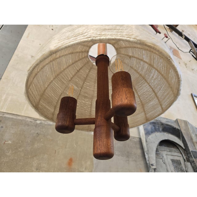 This very elegant designed ceiling light is made by the German Domus company during the 1970's. It's crafted out of solid...