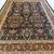 This vintage Turkish rug, approximately 40–50 years old, showcases an exceptionally intricate floral design set against a...