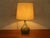 Handcrafted table lamp from the 1970s. High-quality ceramic base with a lampshade in cream. Quality features: very good...