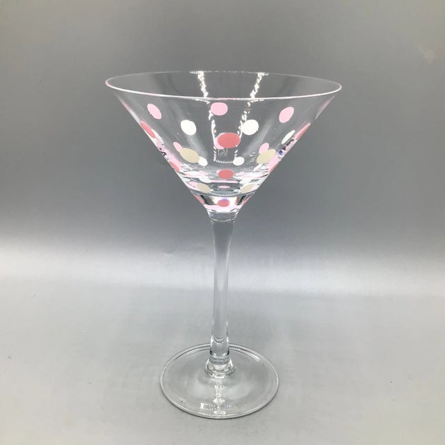 Enjoy martinis with your friends when you use this set of 8 pink and white polka dot blown glass martini glasses. Included...