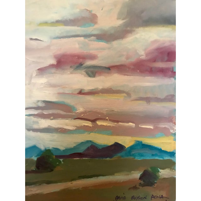 This original oil painting by David Beynon Pena was painted in the southwest of a road traveling under magnificent rosy...