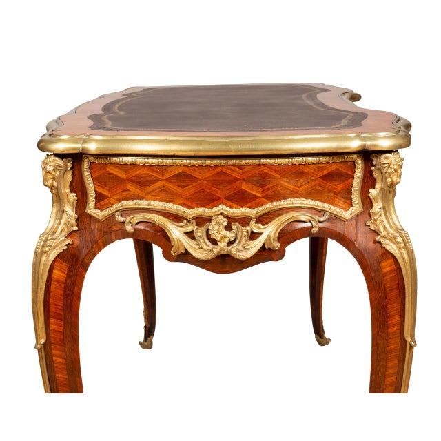 The identical desk and possibly the same one pictured in Les Ebenistes Du XIX Siecle by Denise Ledoux-Lebard. Page 621....