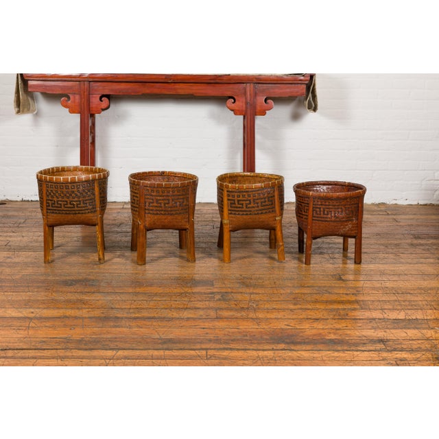 Rustic Mid 20th Century Woven Rattan Basket on Legs with Greek Key Motifs For Sale - Image 3 of 12