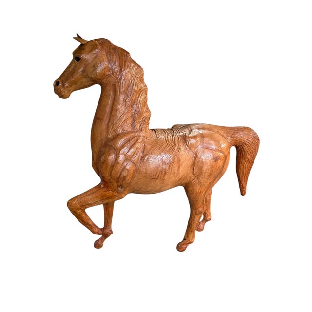 Beautiful vintage mid to late 20th Century large tan leather wrapped sculpture of a prancing horse. Hand crafted with...