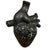 A beautiful anatomical model of a heart modeled in burnished black clay. From a family-run studio in San Bartolo...