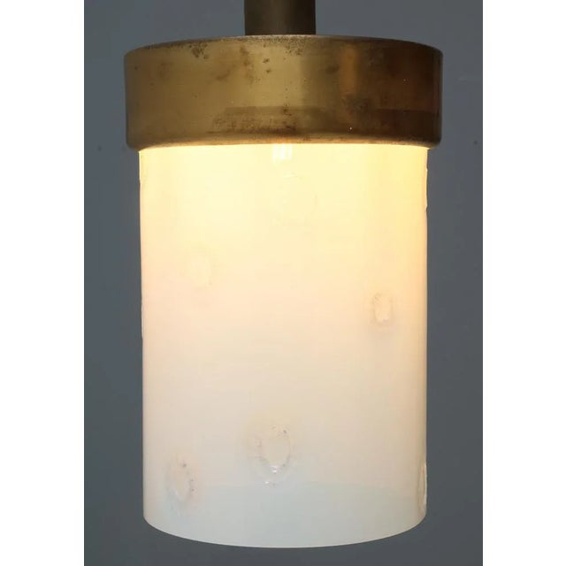 Stunning and rare Mid-Century Modern Murano pendant lamp. Striking Italian design from the 1960s. Patinated bronze and...