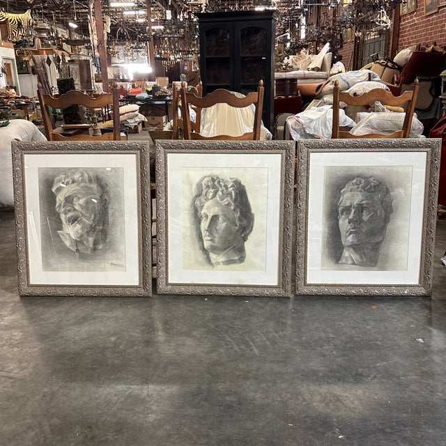 A set of three unique charcoal portraits from Europe executed in Classical Antiquity style from the mid 20th Century....