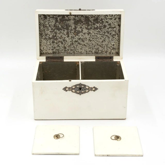 An elegant painted English Victorian Period tea caddy with elaborate metalwork circa 1890, interior with two lids and...