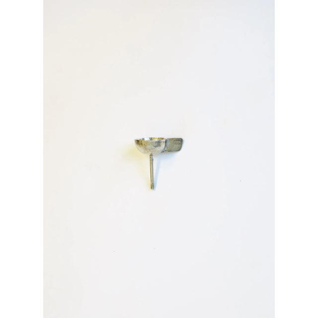 A beautiful sterling silver perfume vanity bottle funnel from luxury maker Dunhill, by Mary Dunhill, circa early-20th...