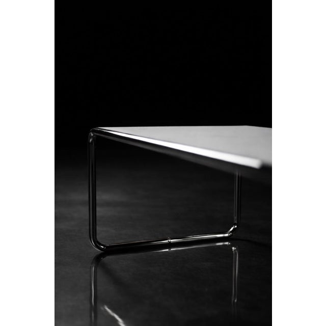 A design icon. The low kiga coffee table is a post-war interpretation of the iconic laccio table, designed by marcel...