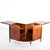 An Italian modernist folding bar cabinet. Bar folds open in the middle and is finished on all sides to be free standing....