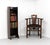 Liberty & Co narrow oak graduated open bookcase. Labelled. Circa 1905. Showing the squashed heart piercing classic to...