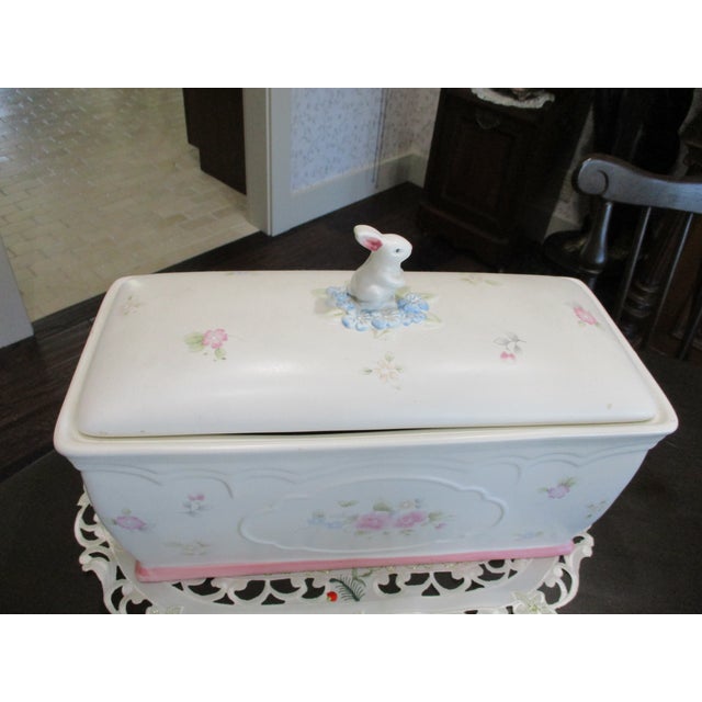 The Pfaltzgraff Tea Rose Ceramic Bunny Bread Box & Lid is a vintage collectible piece perfect for adding charm to any...