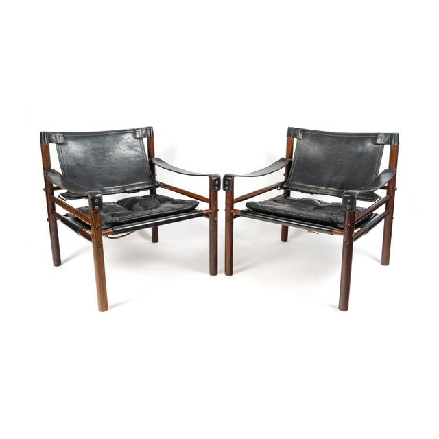 Leather backrest stretched directly between the rear uprights, without an intermediate frame. Turned wood, exposed pegs,...