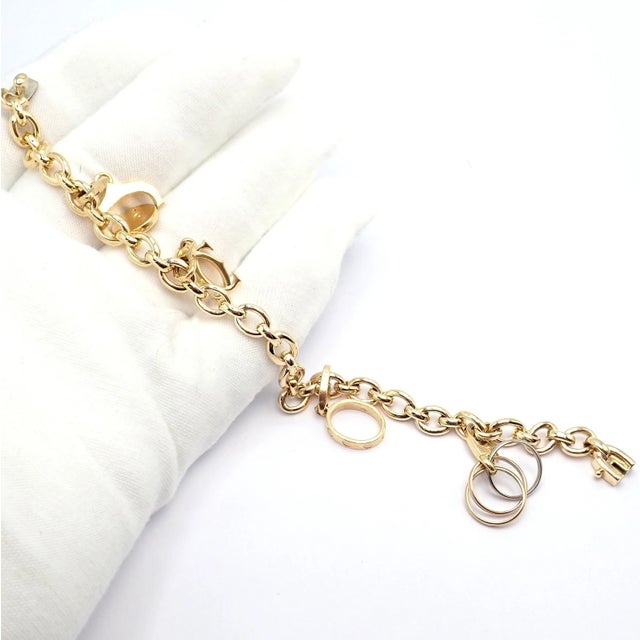 Authentic Cartier Yellow Gold Love Trinity Double C Charm Link Bracelet 1995 For Sale - Image 10 of 13